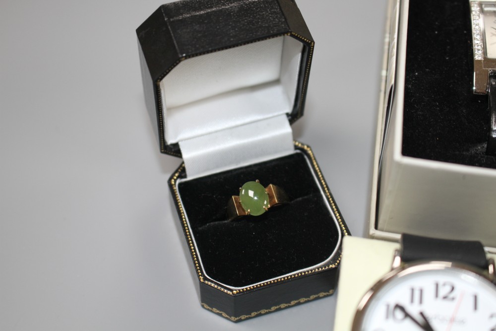 Four assorted modern gentlemans wrist watches, two ladys wrist watches and a 9ct and cabochon jade? ring, gross 4.3 grams.